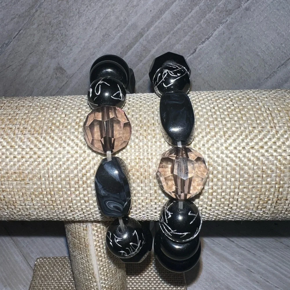 4 black bracelets